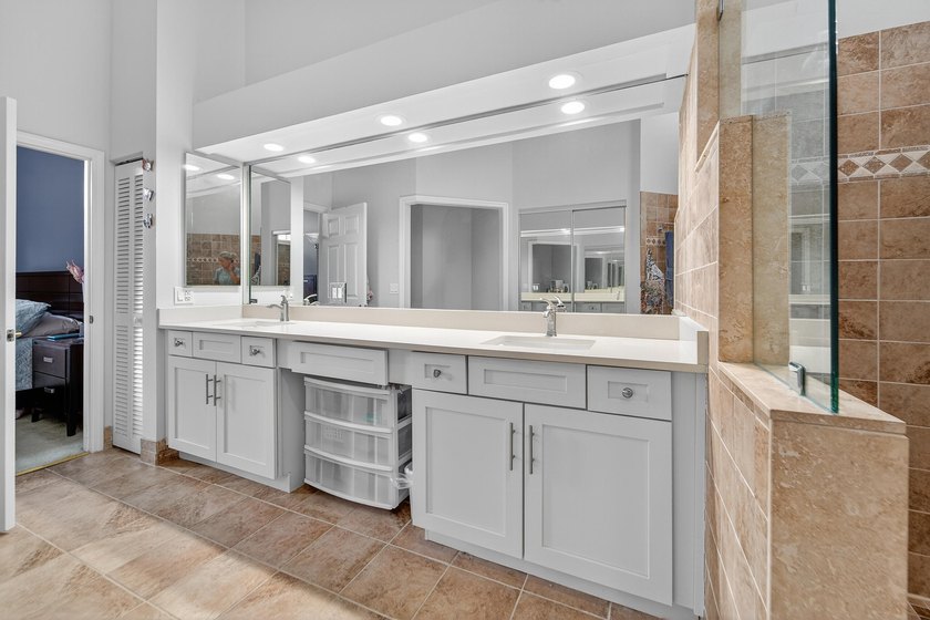 Welcome to Eastpointe Country Club. This large family home sits - photo 10