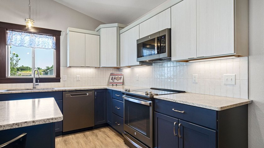 Enjoy easy, low-maintenance living in this nearly new twin home - photo 16