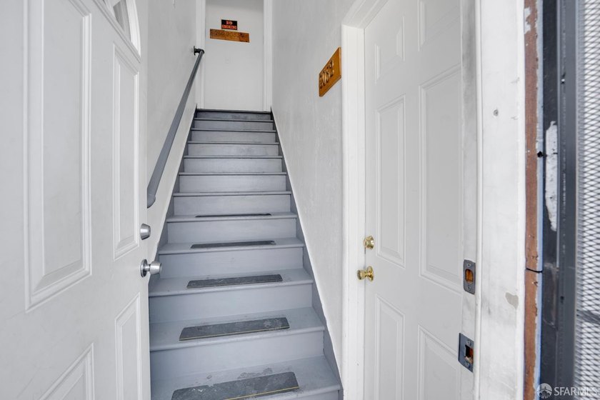 This well-maintained triplex presents a rare opportunity to own - photo 18