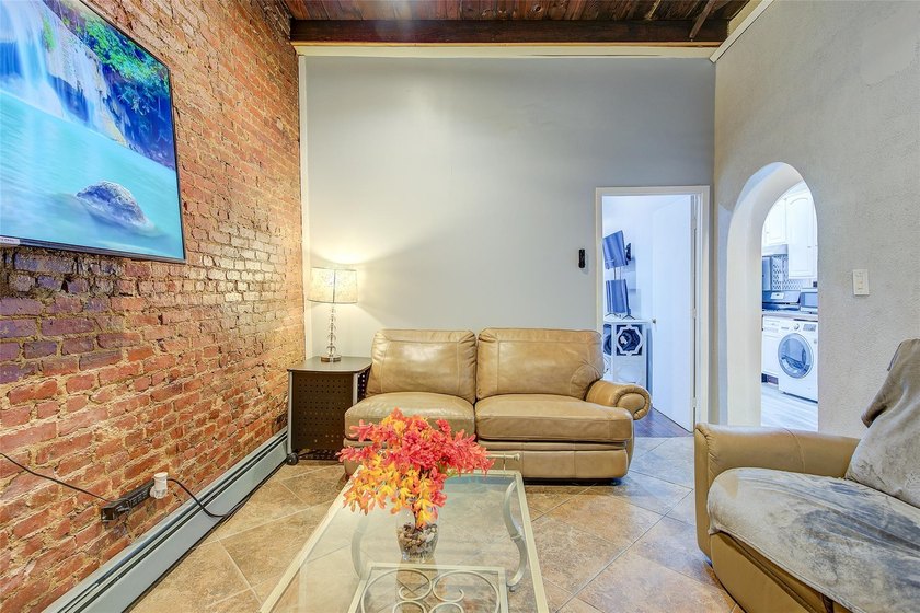This stunning and meticulously maintained all-brick two-family - photo 15