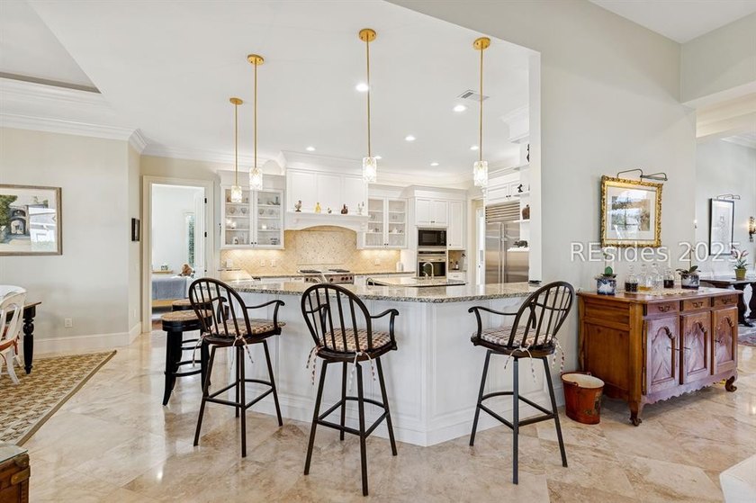 Tranquil waterfront views set the tone for this custom H2-built - photo 16