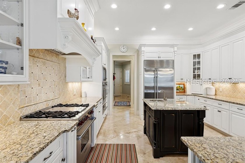 Tranquil waterfront views set the tone for this custom H2-built - photo 21