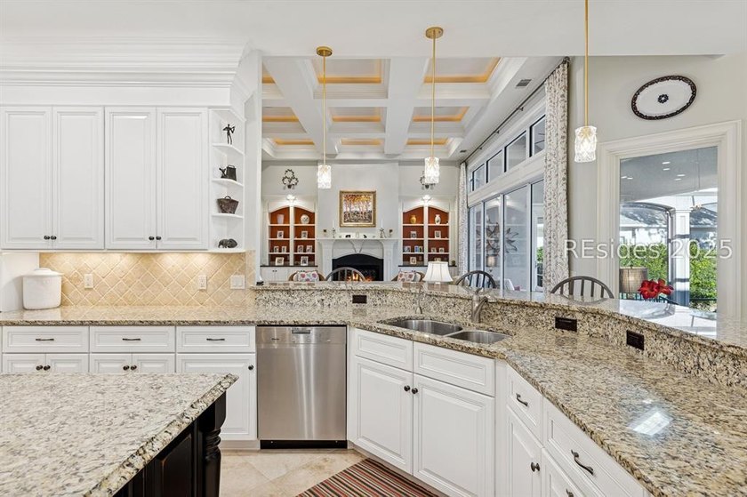 Tranquil waterfront views set the tone for this custom H2-built - photo 23