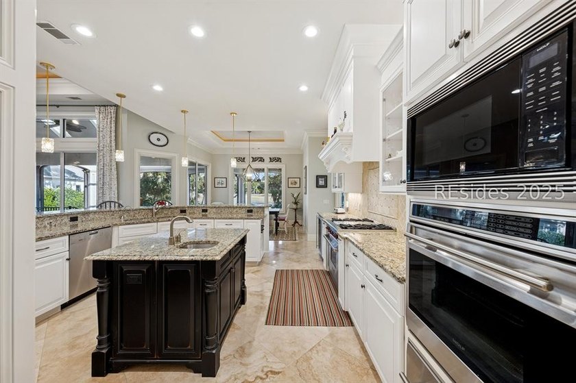 Tranquil waterfront views set the tone for this custom H2-built - photo 24