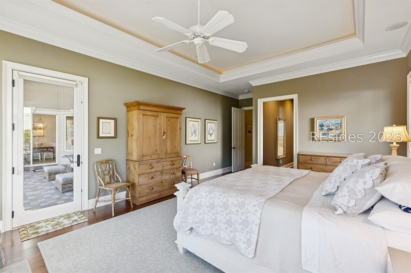 Tranquil waterfront views set the tone for this custom H2-built - photo 33