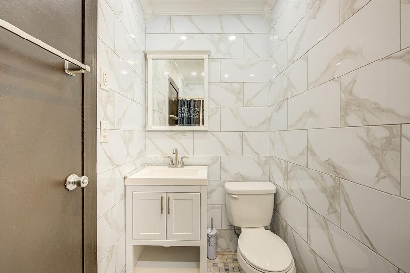 This stunning and meticulously maintained all-brick two-family - photo 33