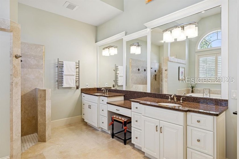 Tranquil waterfront views set the tone for this custom H2-built - photo 35