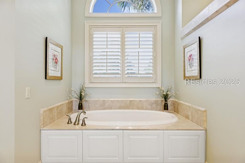 Tranquil waterfront views set the tone for this custom H2-built - photo 39