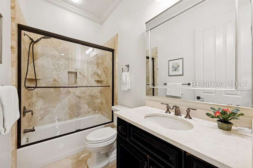 Tranquil waterfront views set the tone for this custom H2-built - photo 44