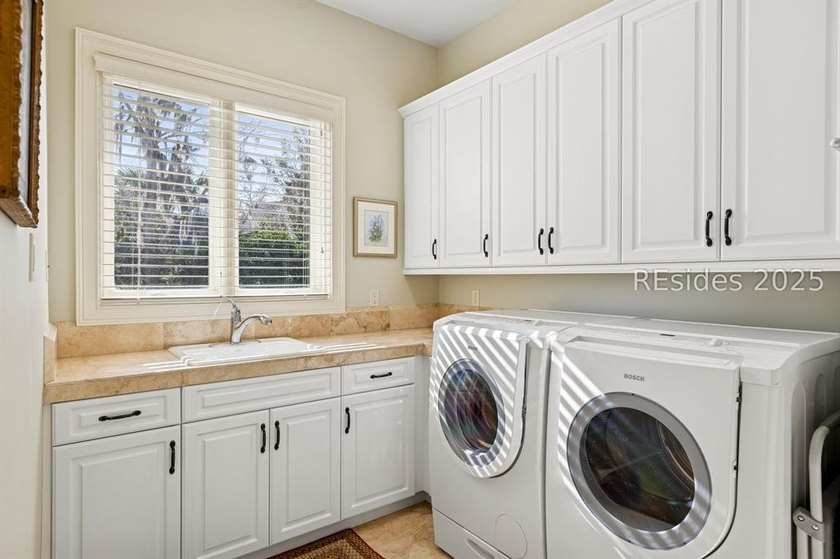 Tranquil waterfront views set the tone for this custom H2-built - photo 45
