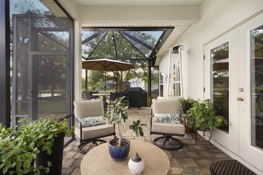 Beach, lake, and woods-this charming home has it all. Located - photo 31