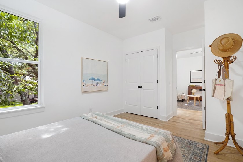Step into this brand-new bungalow-style beach house, centrally - photo 12