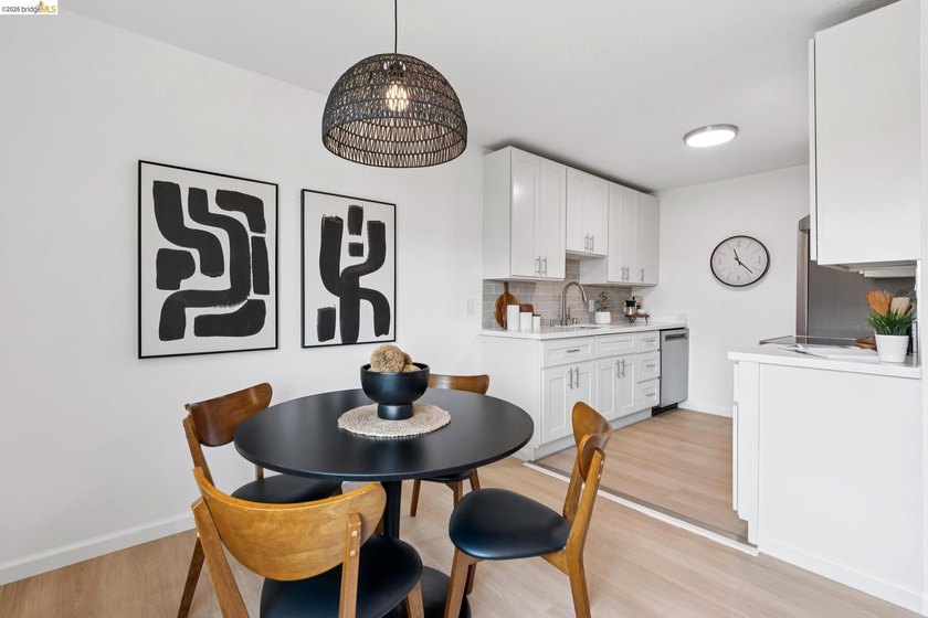 Top floor sun-splashed 2 Bedroom and 1 bath updated condo is - photo 3