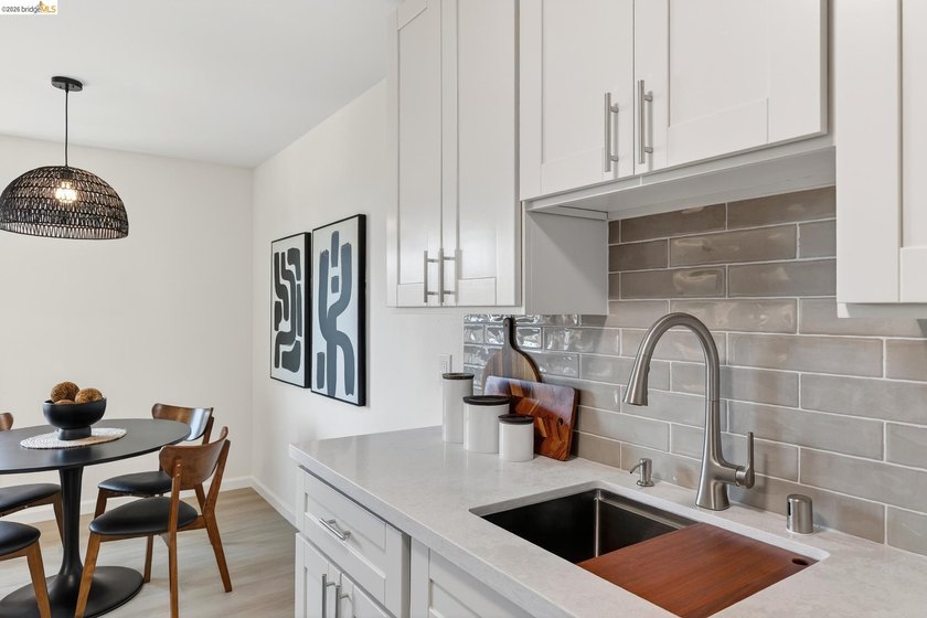 Top floor sun-splashed 2 Bedroom and 1 bath updated condo is - photo 8