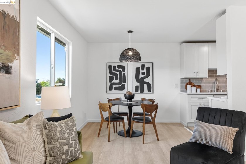 Top floor sun-splashed 2 Bedroom and 1 bath updated condo is - photo 9