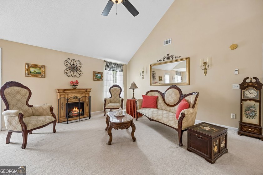As you arrive at this Baytown-style home, you're welcomed by a - photo 7