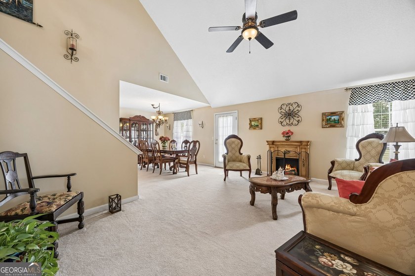 As you arrive at this Baytown-style home, you're welcomed by a - photo 9