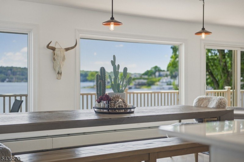 Welcome to this beautifully renovated lakefront retreat offering - photo 8