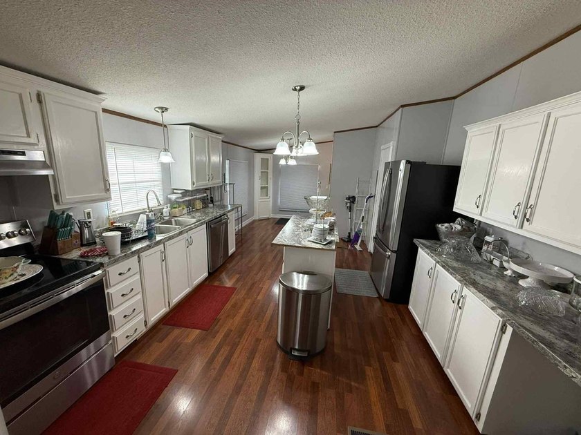 This three-bedroom, two-bathroom haven that has been beautifully - photo 26