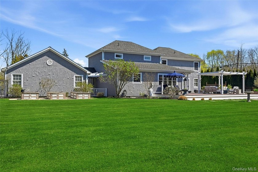 Tucked at the end of a long, private drive on one of Southold's - photo 41