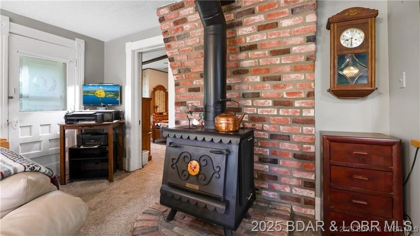Own a piece of historic Old Linn Creek with this beautiful and - photo 11