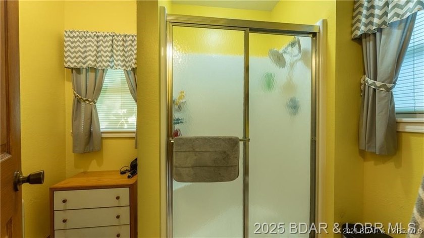 Own a piece of historic Old Linn Creek with this beautiful and - photo 17