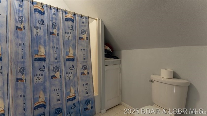 Own a piece of historic Old Linn Creek with this beautiful and - photo 23