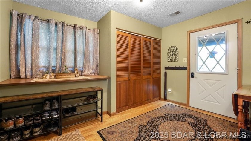Own a piece of historic Old Linn Creek with this beautiful and - photo 25