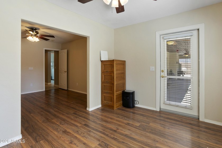 This five-bedroom, four bath home located in the sought-after - photo 17