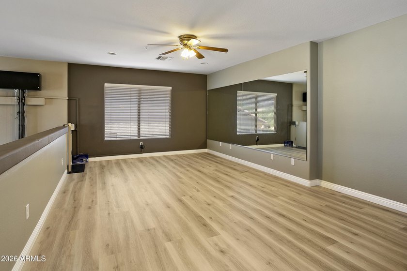 This five-bedroom, four bath home located in the sought-after - photo 21