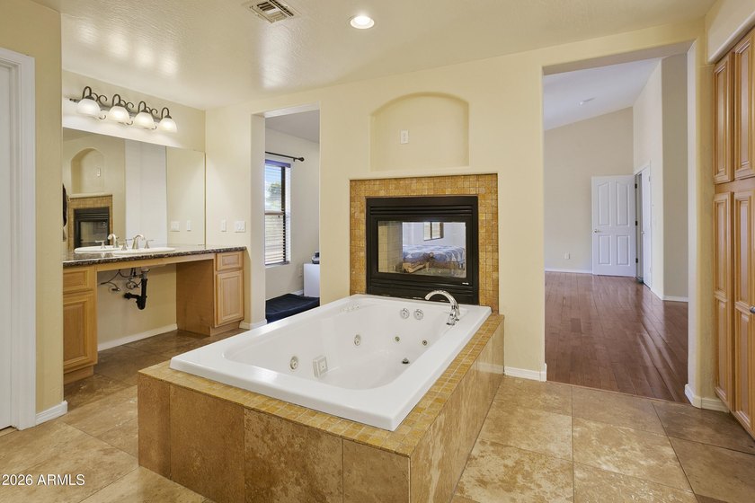This five-bedroom, four bath home located in the sought-after - photo 32