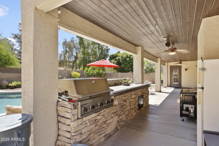 This five-bedroom, four bath home located in the sought-after - photo 35
