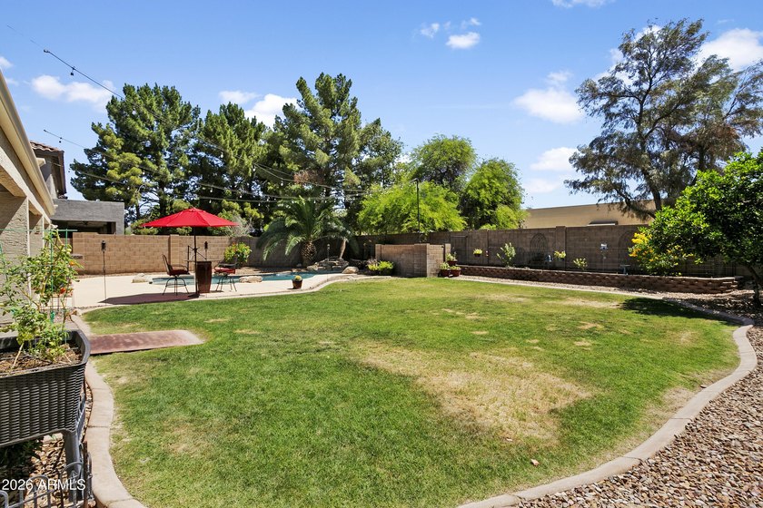This five-bedroom, four bath home located in the sought-after - photo 38