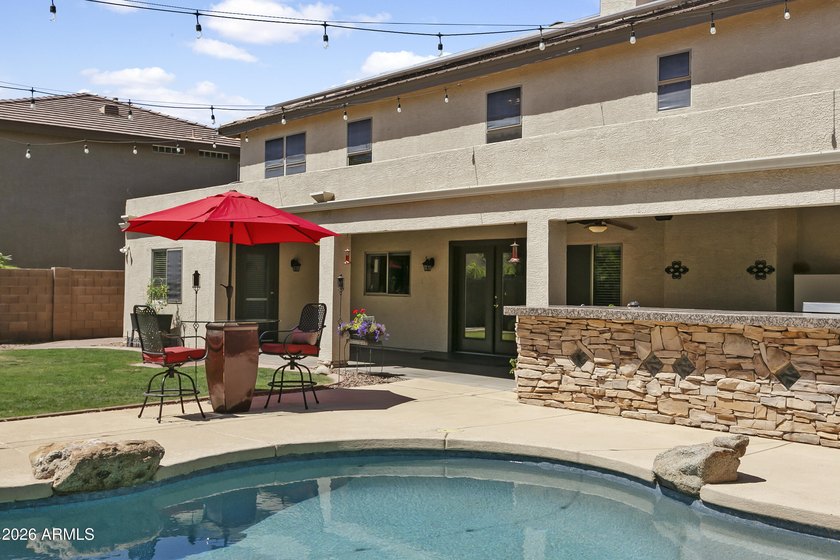 This five-bedroom, four bath home located in the sought-after - photo 42
