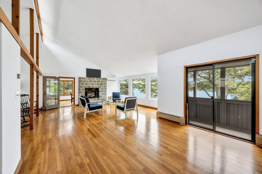Set on over 3 private acres along the protected shores of - photo 14