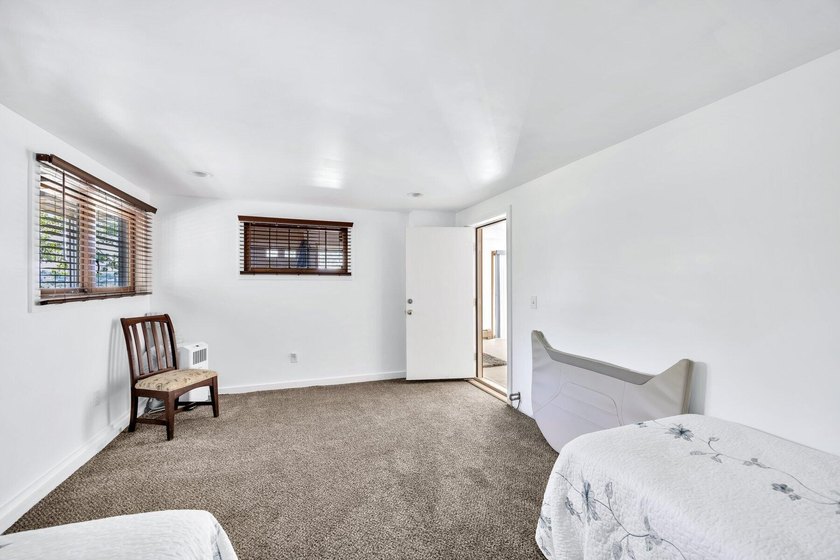 Set on over 3 private acres along the protected shores of - photo 35