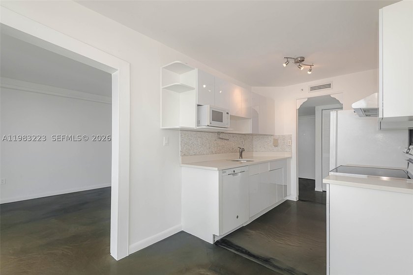 Top-floor unit with amazing bay and Intracoastal views. Features - photo 11