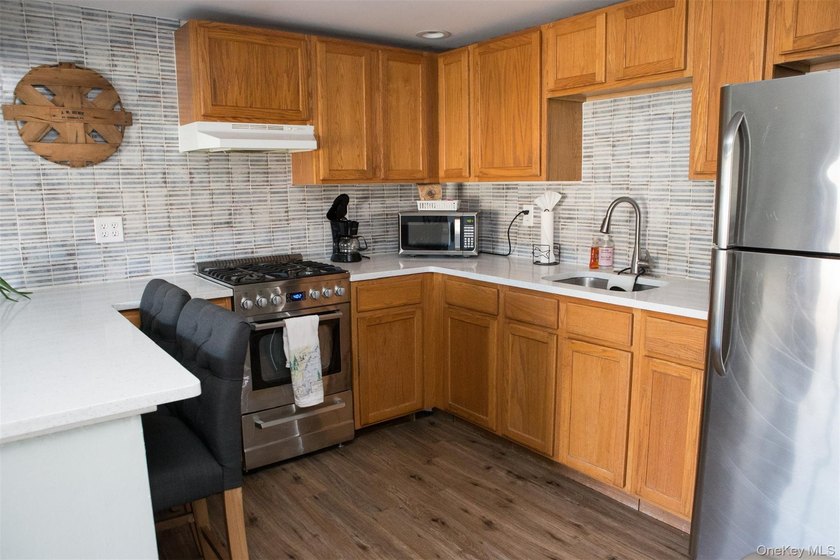 Live the lake life and generate rental income! This rare - photo 11