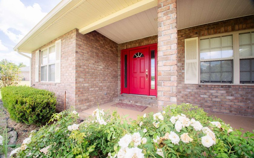 Welcome home to this beautiful, move-in-ready brick home located - photo 2