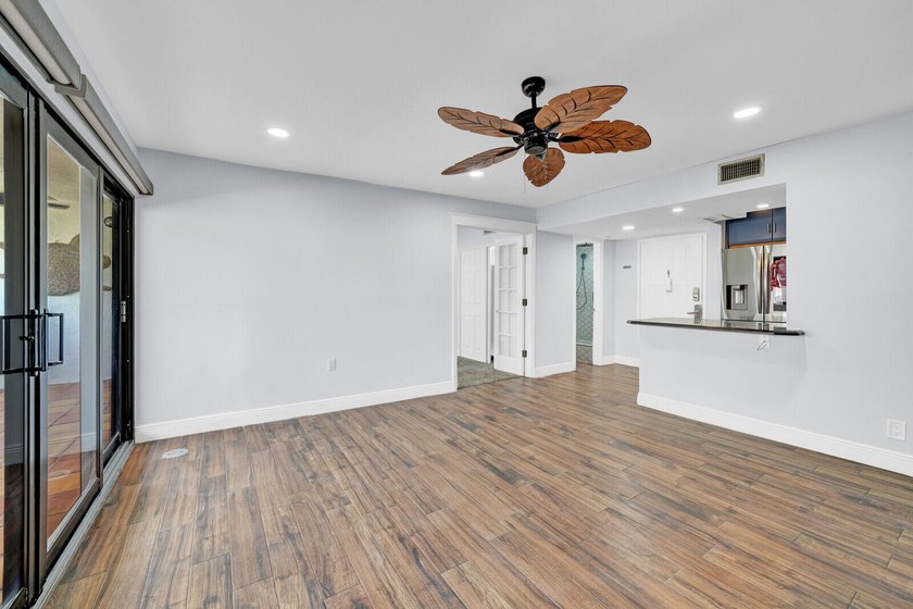 Experience coastal living at its finest from this beautifully - photo 12