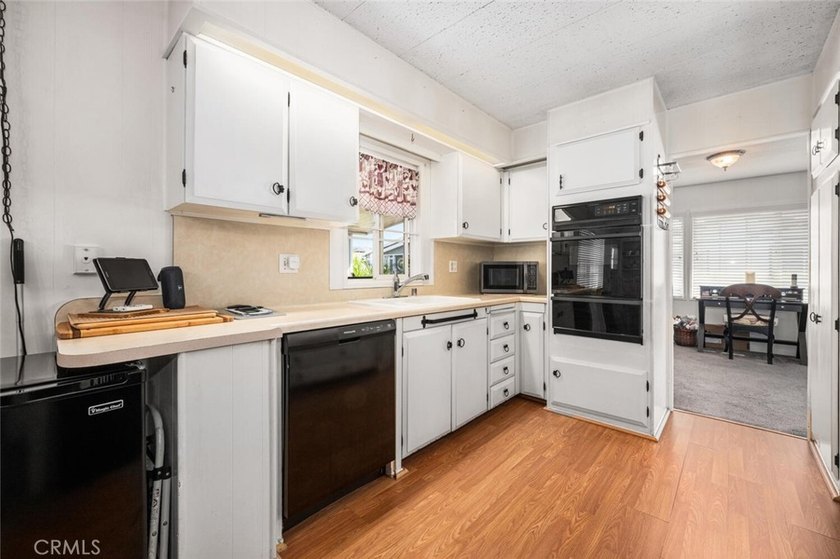 This 55+ community home really delivers, situated in the highly - photo 13