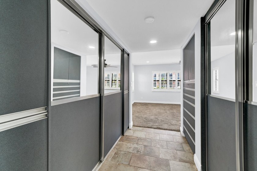 Experience coastal living at its finest from this beautifully - photo 19