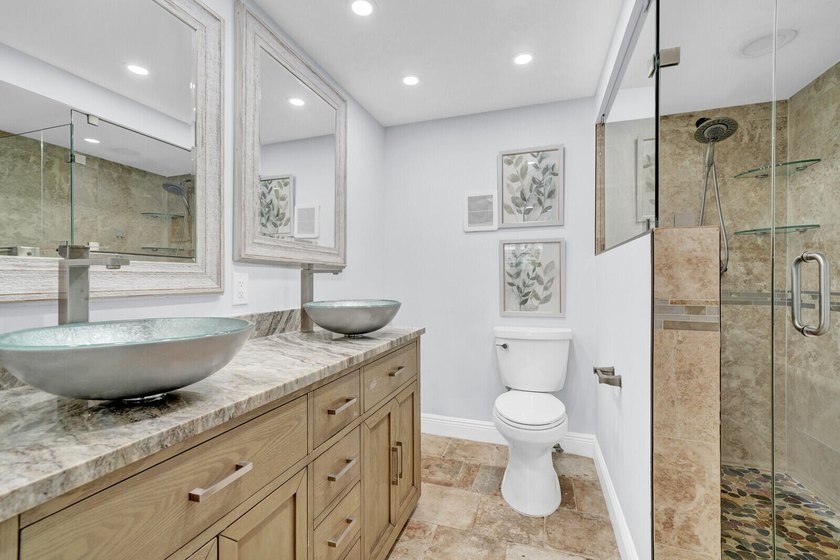 Experience coastal living at its finest from this beautifully - photo 20