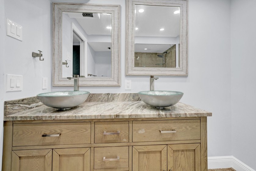 Experience coastal living at its finest from this beautifully - photo 21
