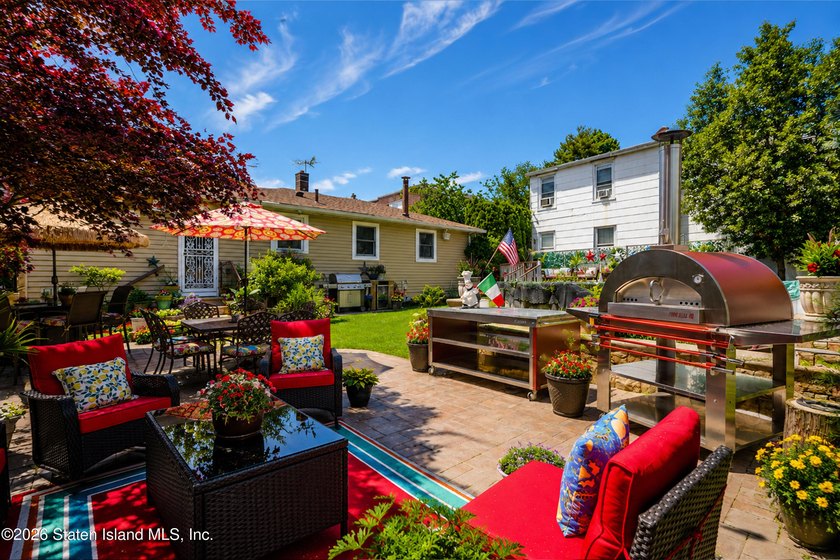 Welcome to 103 Cedar Avenue, a beautifully renovated raised - photo 29
