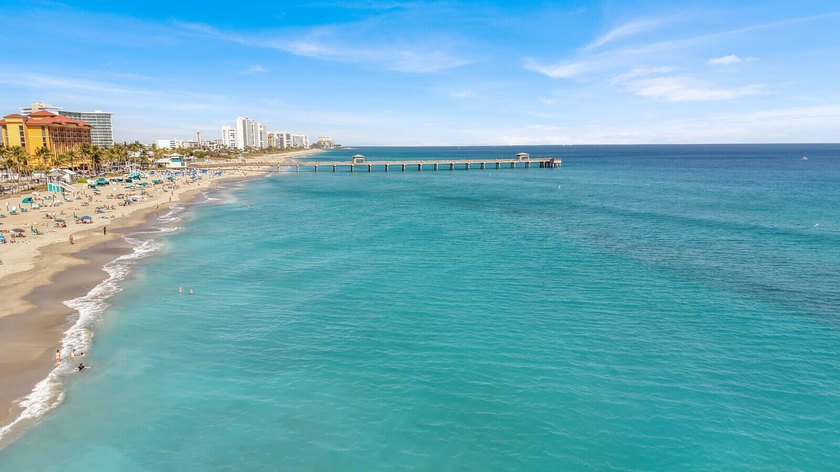 Experience coastal living at its finest from this beautifully - photo 47