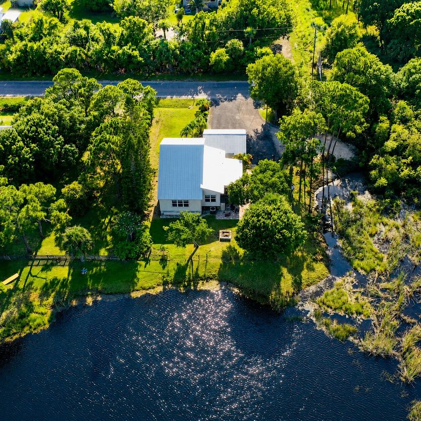 Rare lakefront sanctuary with endless possibilities! Own this - photo 3