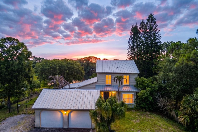 Rare lakefront sanctuary with endless possibilities! Own this - photo 4