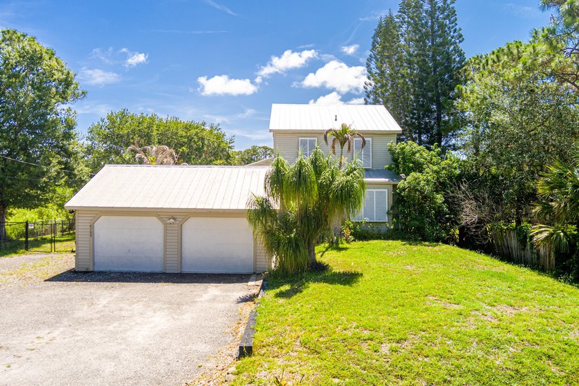 Rare lakefront sanctuary with endless possibilities! Own this - photo 5