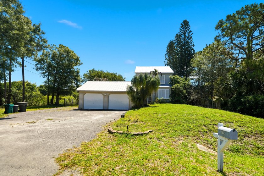 Rare lakefront sanctuary with endless possibilities! Own this - photo 8